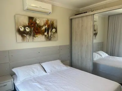 Uma cama ou camas num quarto em Res Costa Verde