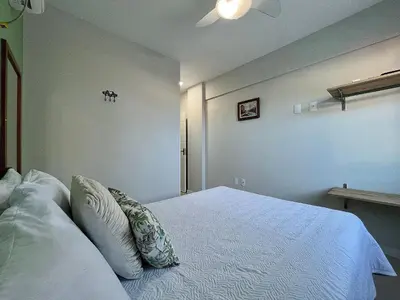 Uma cama ou camas num quarto em Residencial Açores