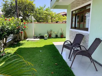 Um jardim no exterior de 053 - Casa de praia para até 10 pessoas Bombinhas, com 4 vagas de garagem