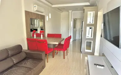 Uma área de estar em Apartamento Avenida F