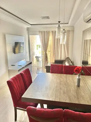 Uma televisão e/ou sistema de entretenimento em Apartamento Avenida F
