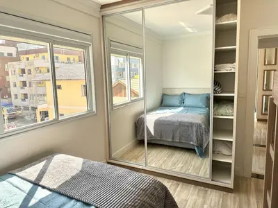 Uma cama ou camas num quarto em Apartamento Avenida F