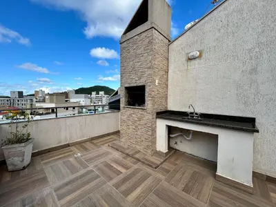 Uma varanda ou terraço em Ed Las Condes - Bombinhas