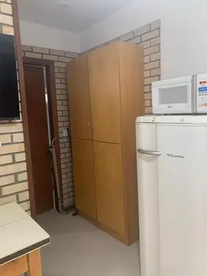 A cozinha ou kitchenette de Bombinhas Quinta do Mar Complexo A