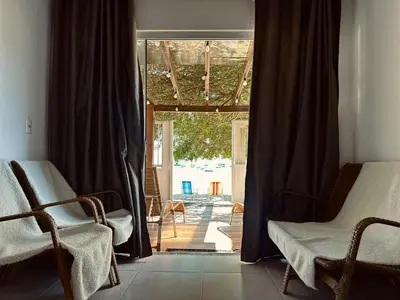 Uma área de estar em Casa de praia Ponta dos Ganchos de Fora