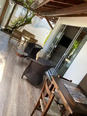 Uma área de estar em Casa de praia Ponta dos Ganchos de Fora