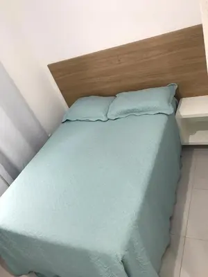 Uma cama ou camas num quarto em Casa de praia Ponta dos Ganchos de Fora