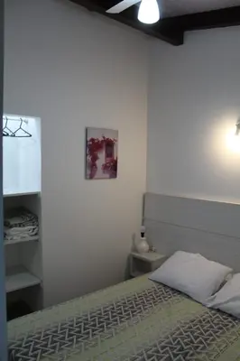 Uma cama ou camas num quarto em Residencial Annabel Apto 04