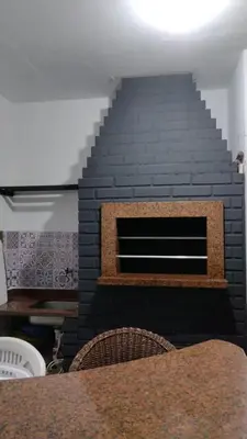 Uma área de estar em Itapema-Meia Praia- quartos -Frente Mar!