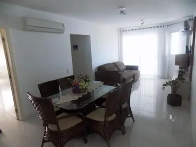 Uma área de estar em Temporada Praia de Palmas SC