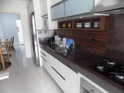 A cozinha ou kitchenette de Temporada Praia de Palmas SC