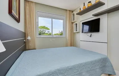 A planta de 1021 Apartamento em condomínio com piscina localizado na Avenida da praia do centro de Bombinhas