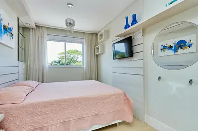 A planta de 1021 Apartamento em condomínio com piscina localizado na Avenida da praia do centro de Bombinhas