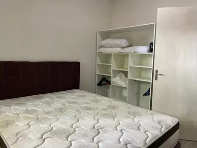 Uma cama ou camas num quarto em Casa Barata Próxima a Praia
