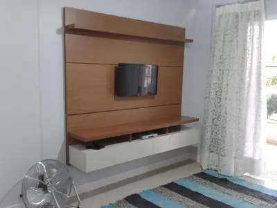 Uma televisão e/ou sistema de entretenimento em Ótimo Apto. em Bombas