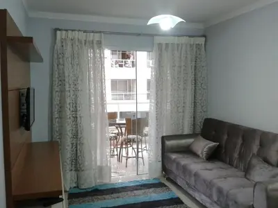 Uma área de estar em Ótimo Apto. em Bombas