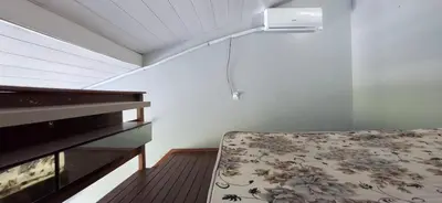 Uma cama ou camas num quarto em CK - APTO TIPO LOFT Individual ar, wifi QQ