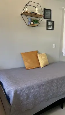 Uma cama ou camas num quarto em Residencial Rumo ao Mar - Bombinhas-SC