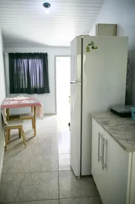 A planta de KIT 5 - Estúdio com churrasqueira piscina ar wifI vaga cozinha
