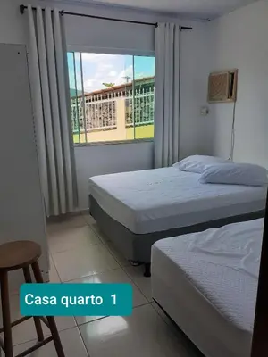 Uma cama ou camas num quarto em Residencial Di Paoli