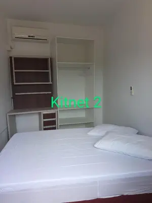 Uma cama ou camas num quarto em Residencial Di Paoli
