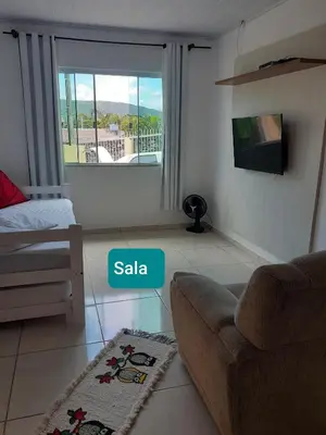 Uma cama ou camas num quarto em Residencial Di Paoli
