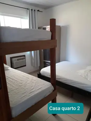 Uma cama ou camas num quarto em Residencial Di Paoli