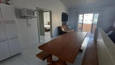 Uma televisão e/ou sistema de entretenimento em DS2 - 2 Dorm PIscina AR WIFI Churrasqueira - BRUNO KLEMTZ