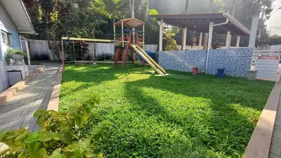A área de jogos para crianças em DS2 - 2 Dorm PIscina AR WIFI Churrasqueira - BRUNO KLEMTZ