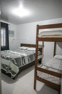 A planta de DK2 CASA PISCINA CHURRASQUEIRA SINUCA 3 AR WIFI 3 VaGAS 3 DORM 6 X SEM JUROS NO CARTÃO