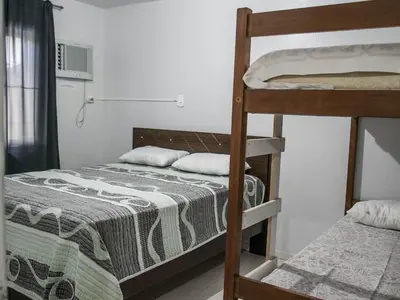 A planta de DK2 CASA PISCINA CHURRASQUEIRA SINUCA 3 AR WIFI 3 VaGAS 3 DORM 6 X SEM JUROS NO CARTÃO