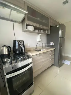 A cozinha ou kitchenette de Apto Novinho na Praia de Palmas