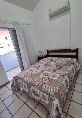 Uma cama ou camas num quarto em Casa de praia em Palmas-SC a 40 metros do mar