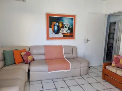 Uma área de estar em Casa de praia em Palmas-SC a 40 metros do mar