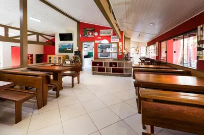 Um restaurante ou outro lugar para comer em Pousada Vila Taquaras