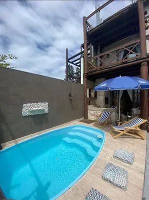 A piscina em ou perto de Estaleiro Casa Hotel