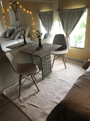 Uma área de estar em Estaleiro Casa Hotel