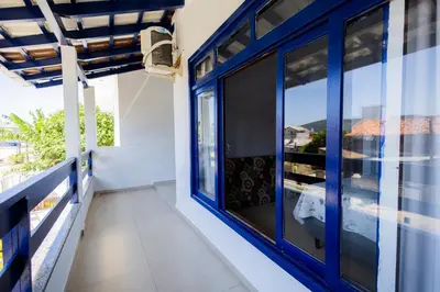 Uma varanda ou terraço em Bela e Aconchegante