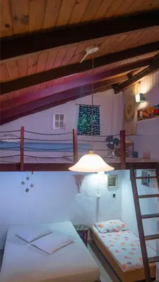 Uma cama ou camas num quarto em Casa Mico Leão Dourado