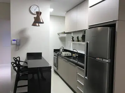 A cozinha ou kitchenette de ANSNEGOCIOS LINDO APTO PRAIA MARISCAL CASAGRANDE- Ac