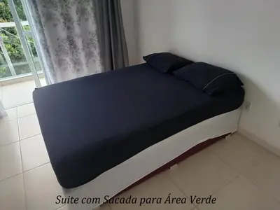 Uma cama ou camas num quarto em Lindo AP Palmas