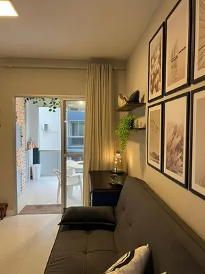 Uma área de estar em 3 Quartos beira Mar com Wifi e ar condicionado