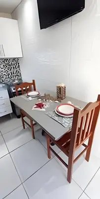 A cozinha ou kitchenette de Apartamento térreo climatizado próximo a praia