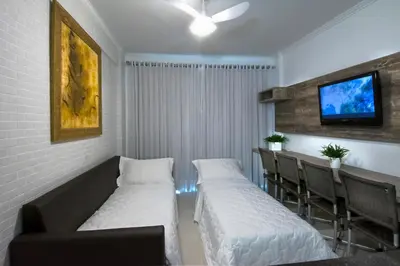 Uma cama ou camas num quarto em Pousada Bora Bora