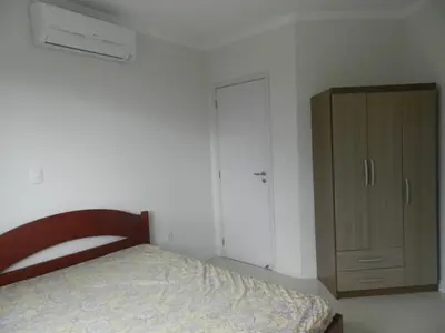 Uma cama ou camas num quarto em Reserva Jardim