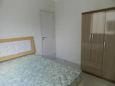 Uma cama ou camas num quarto em Reserva Jardim
