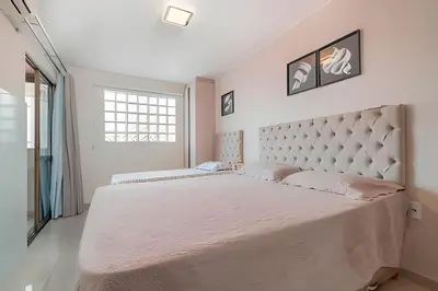 Uma cama ou camas num quarto em Residencial Ribeiro