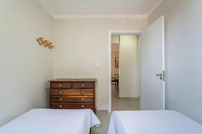 Uma cama ou camas num quarto em Residencial Ilha de Majorca