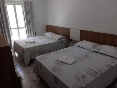 Uma cama ou camas num quarto em Pousada Terra do Sol