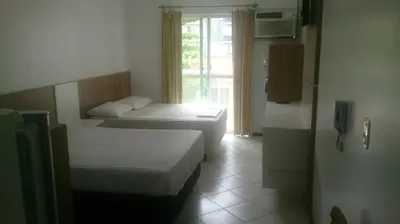 Uma cama ou camas num quarto em Pousada Terra do Sol